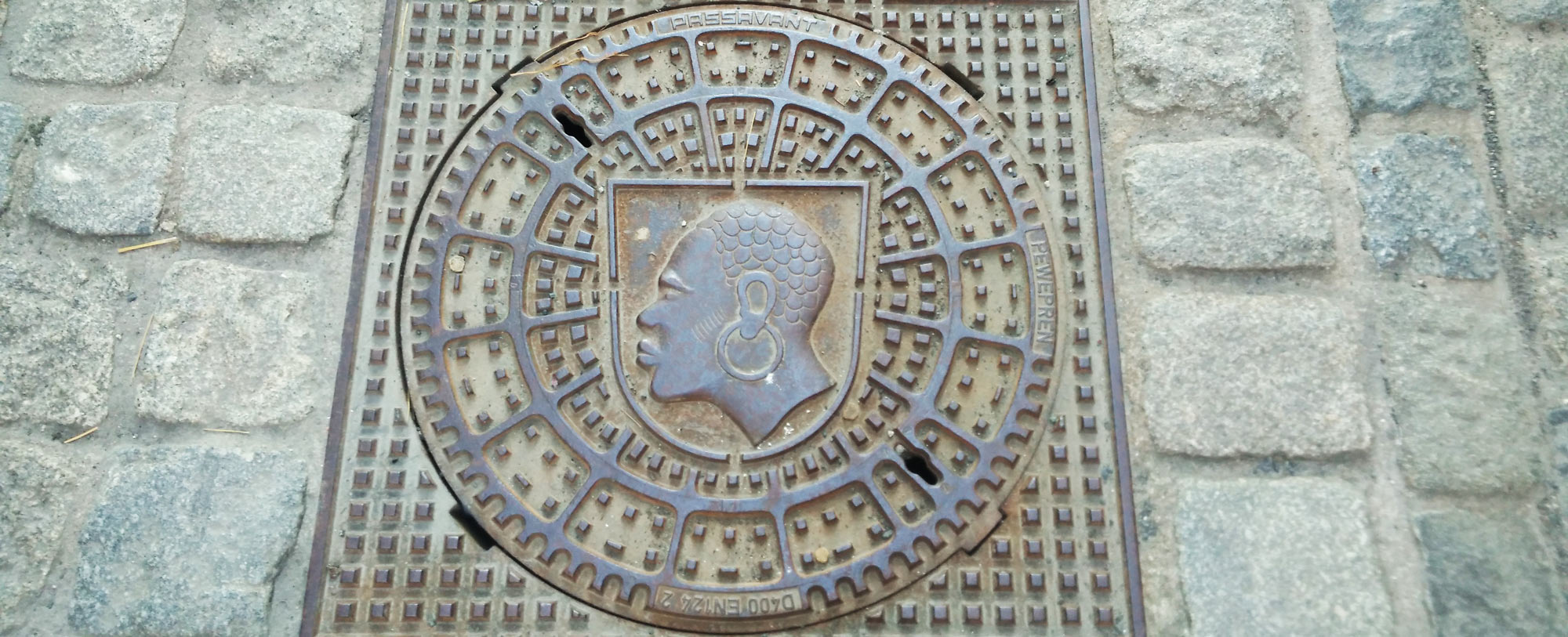 gully cover with Saint Maurice portrayed as a blackamoor