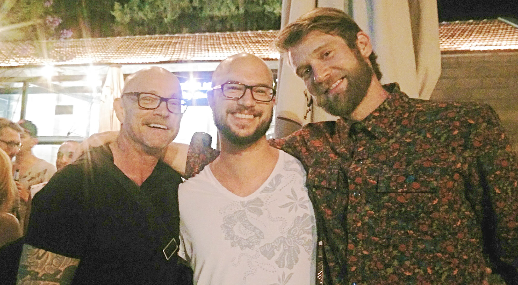 Photo of actor of adult entertainers and LGBT activists Buck Angel and Colby Keller with Martin Wolkner, director of Filmfest homochrom in Cologne und Dortmund